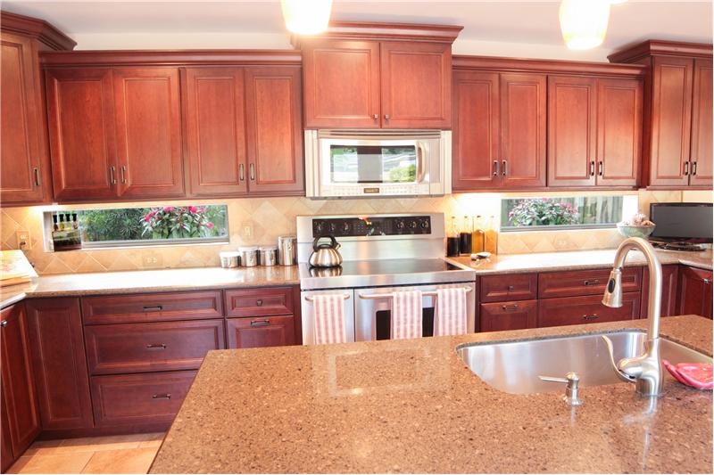 Kitchen with Kenmore Elite stainless steel appliances