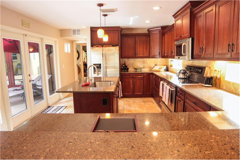 Kitchen with custom wood cabinetry