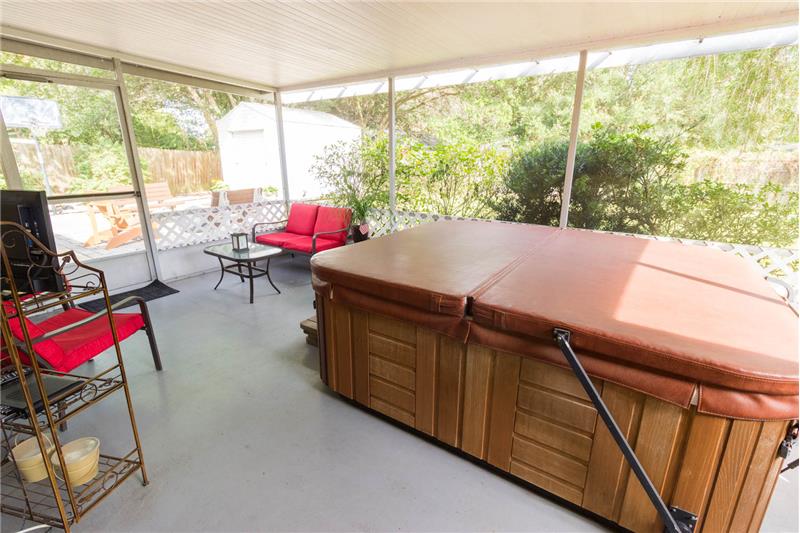 Screened in porch with spa