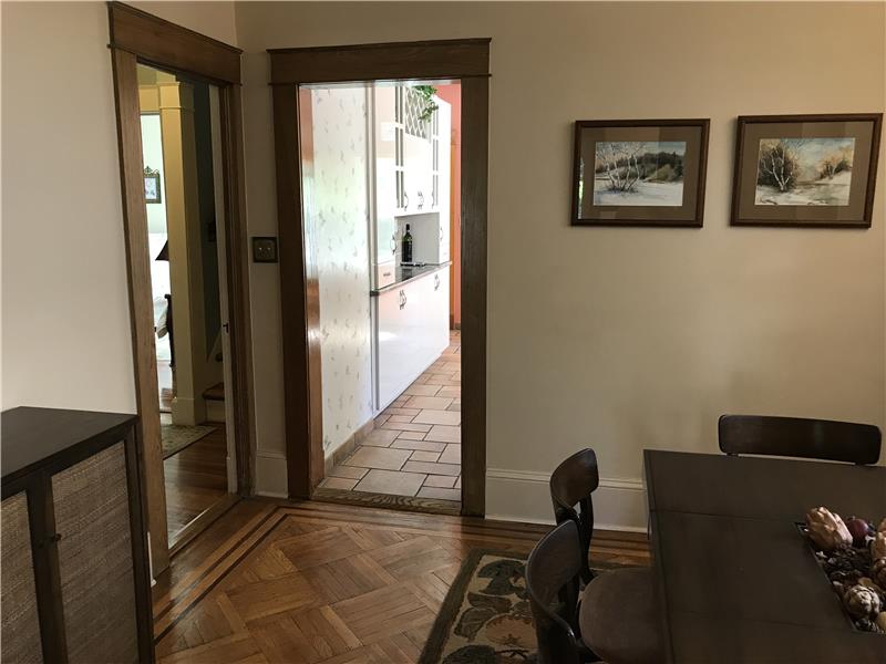 Door to kitchen from dining room.