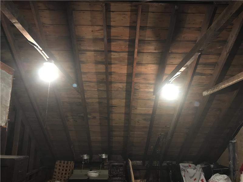 rafters in storage room ceiling on second floor.