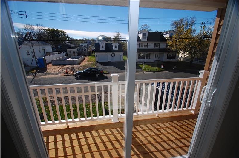 LARGE WOOD DECK OFF REAR