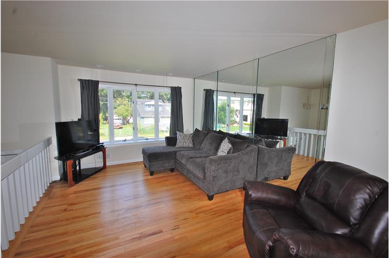 Spacious Living Room-Hardwood Floors