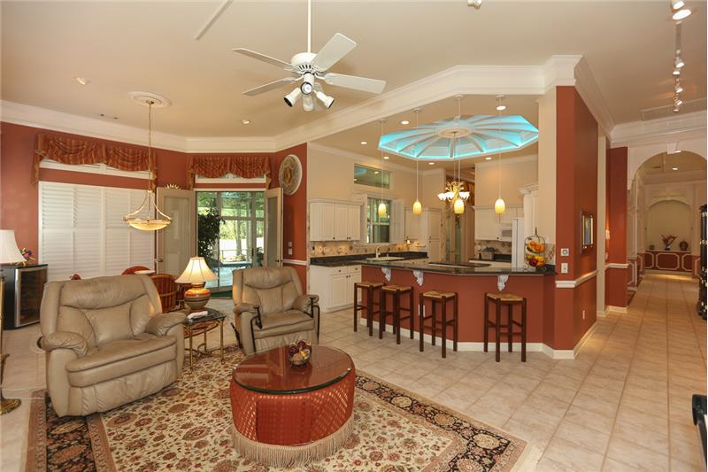This is the open floor plan with the dome lighting turned on in the kitchen--choose from the rainbow of colors or just white.
