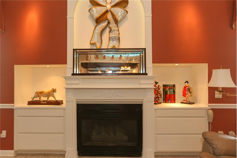 The artwork and Titanic model are for sale separately.  The gas fireplace is a beautiful focal point for the room.
