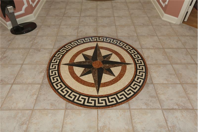 Gorgeous inlaid compass tile.