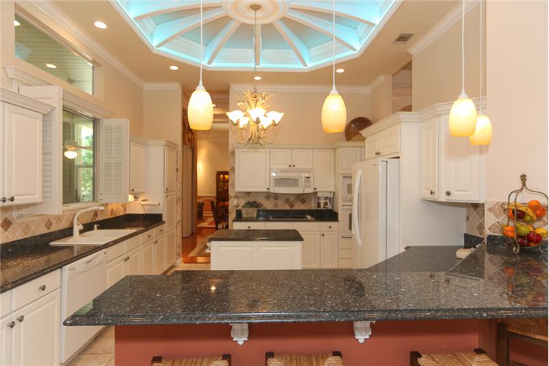 View of the pendant lights over the casual dining bar.