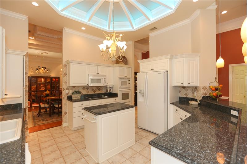 View of the kitchen from the casual dining area.