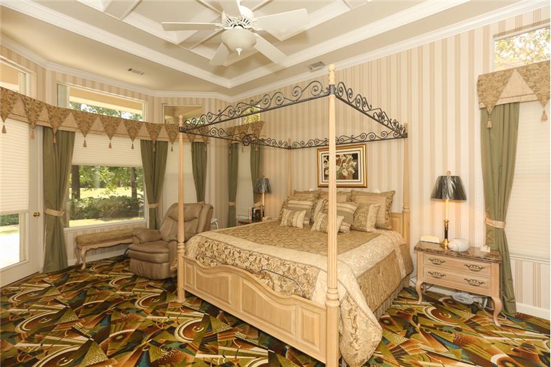You will enjoy the beautiful coffered ceiling and upgraded 