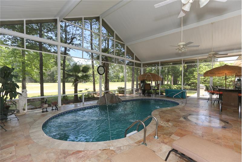 A view of the heated salt water pool from the door to the service area.