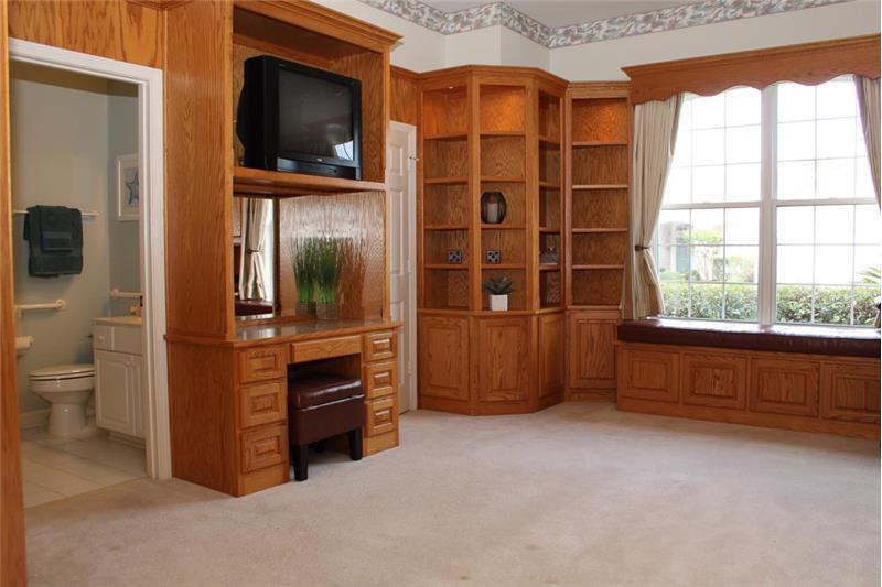 The bedroom suite includes a full bath, walk-in closet, & Murphy bed.
