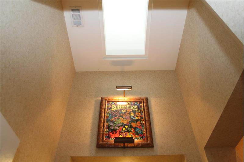 Wonderful powder room skylight above the sink.