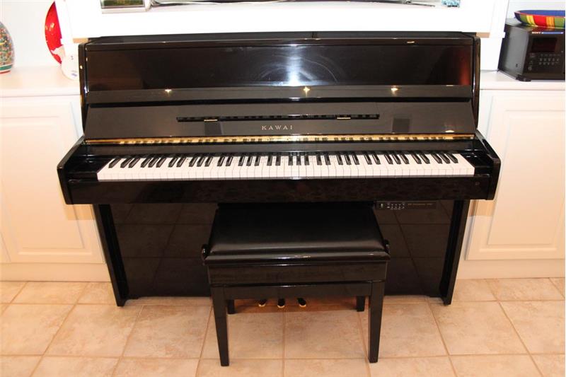Kawai player piano is negotiable--wait until you hear it! You will want to buy it!