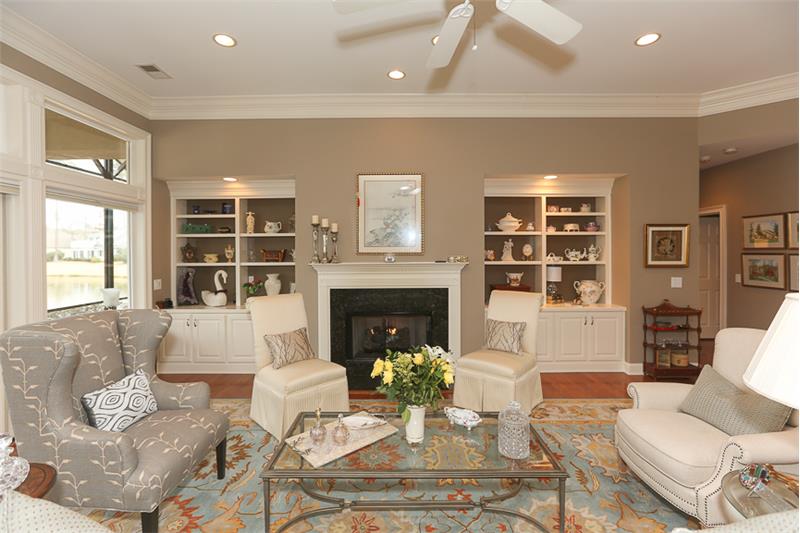 Crown moldings and built-ins around the gas fireplace make this room spectacular!