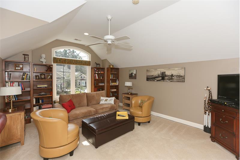 Custom built-in cabinetry adds to the window seat