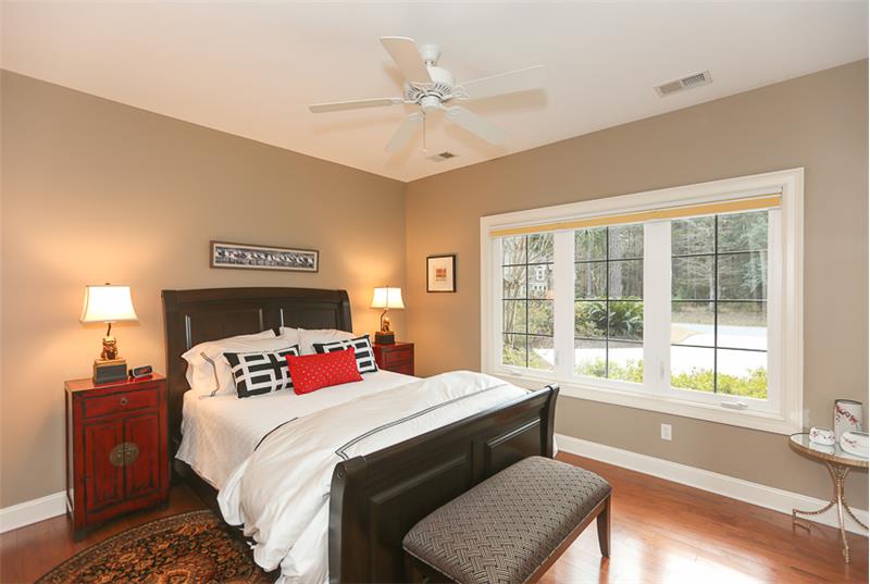 Bedroom #3 also has wood floors and a ceiling fan.