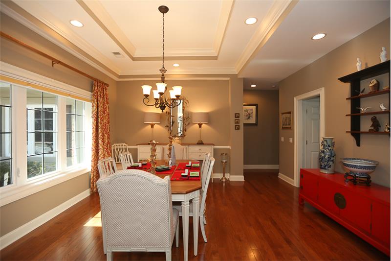 Check out the beautiful double-tray ceiling with crown molding.