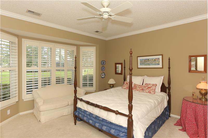Owners' bedroom with bay windows