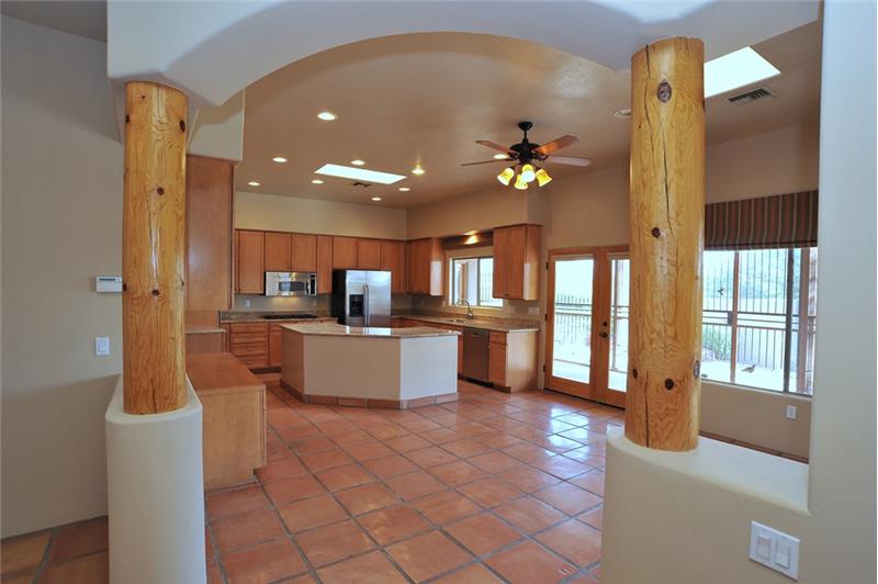 Grand pillar entrance to kitchen great area