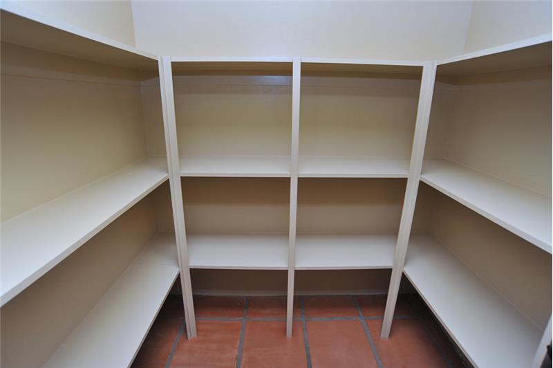 Walk-in pantry provides excellent storage