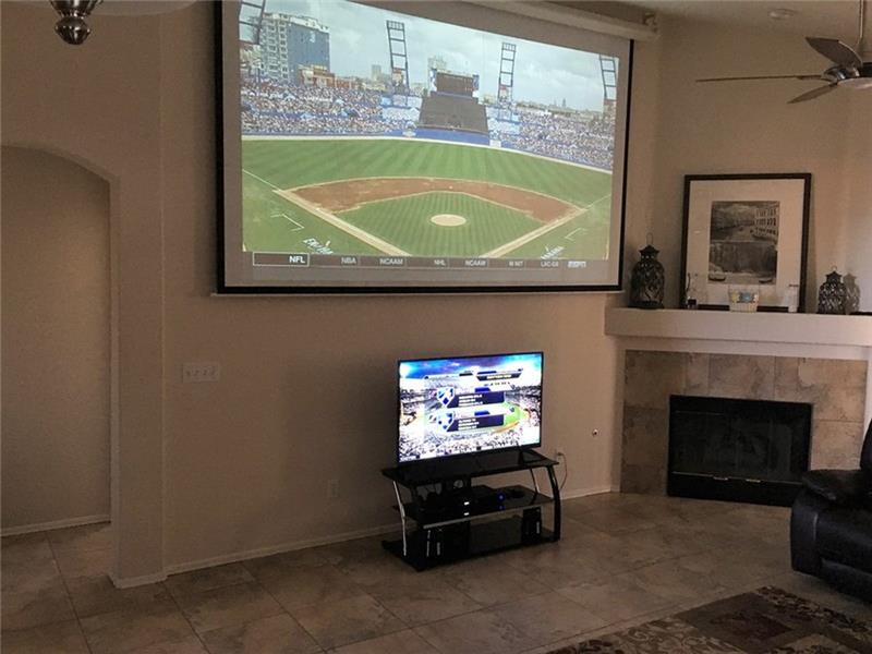 Large retractable 10' wide screen, hi-def HDMI capable projector included
