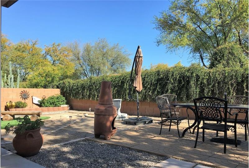 Beautifully landscaped & private low-maintenance yard