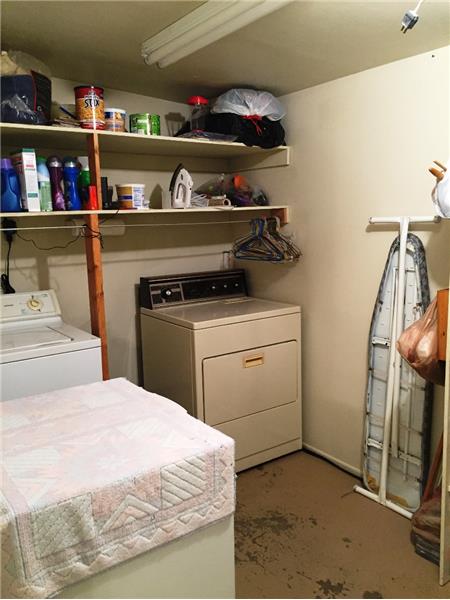 Laundry Room Extends Opposite End for Additional Storage