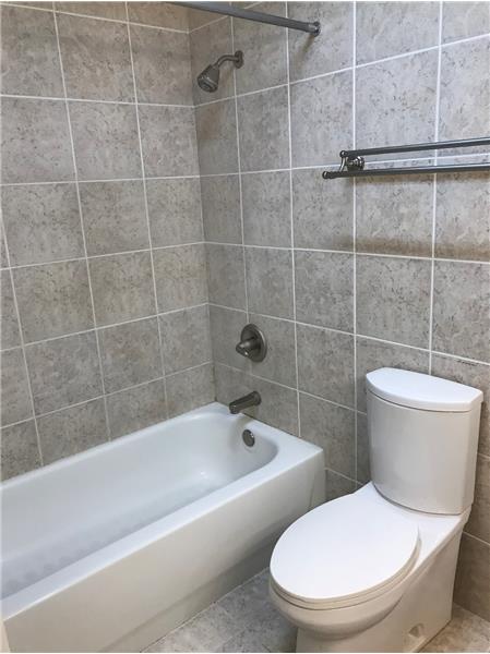 Low-Water Efficient Commode & Remodeled Bath