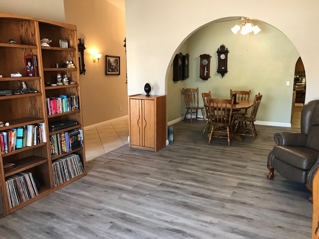 Living Room with new laminate open to dining area