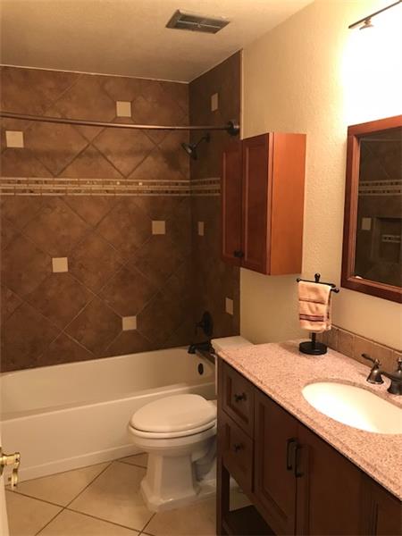 Bathtub with custom tile