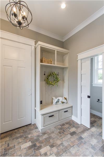 Drop Zone/Mudroom off Kitchen and Powder Room with access to garage
