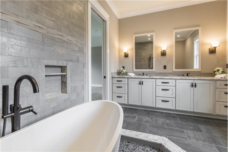 1st floor en suite bathroom with 10' honed granite vanity with double sinks