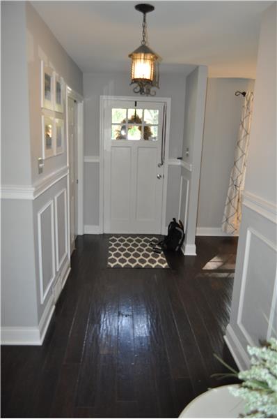 Foyer - Notice the wide planked hardwood floors