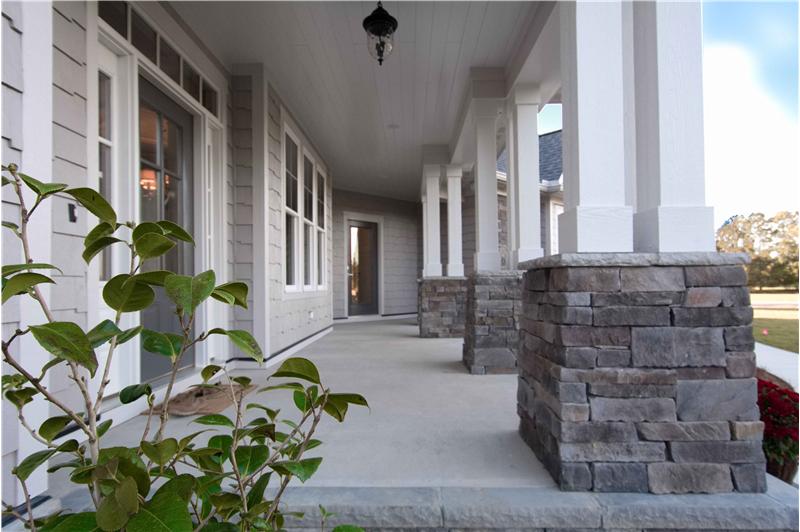 Stunning stone work on the covered front porch
