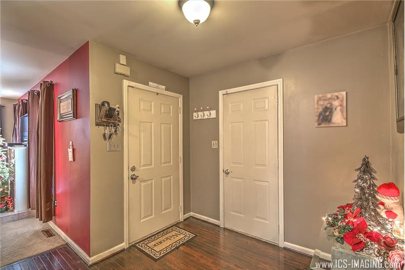 Foyer With Hardwood Floors