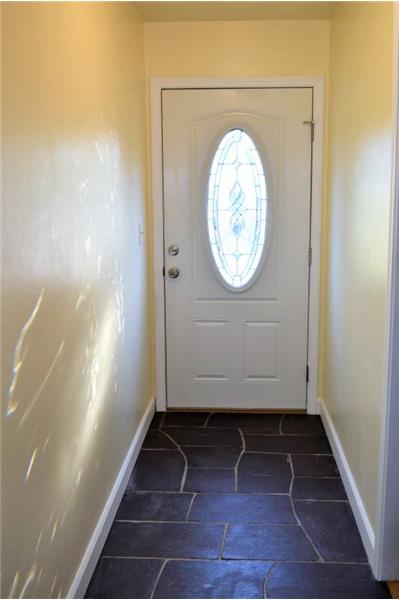 The front door welcomes the light into the house