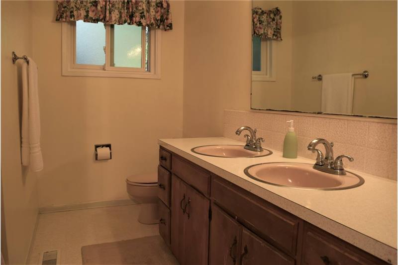Enjoy his and her sinks in the full bath