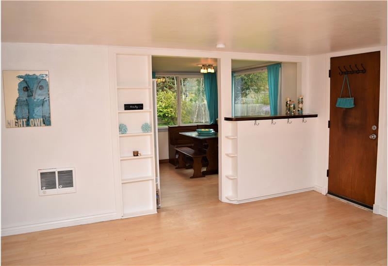 Notice the second entrance. This door opens onto a very large screened-in porch.