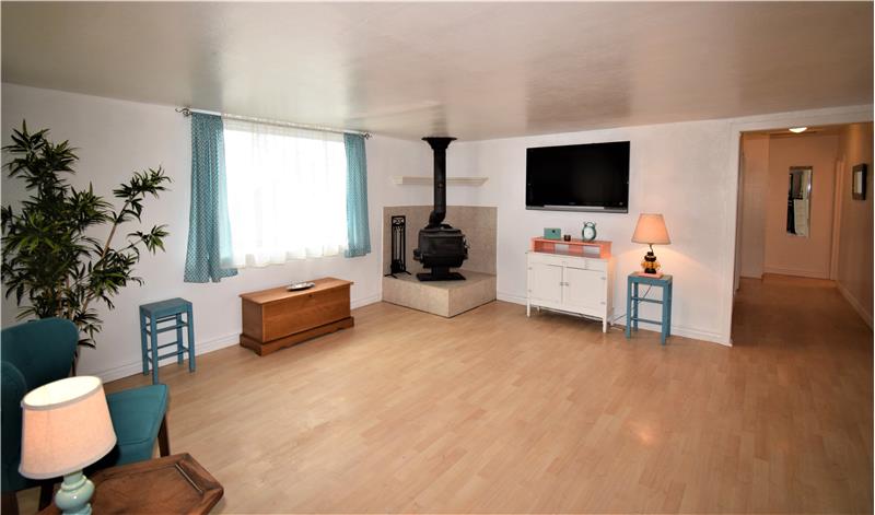 Notice the extra wide hallway leading to the two bedrooms and bonus room.