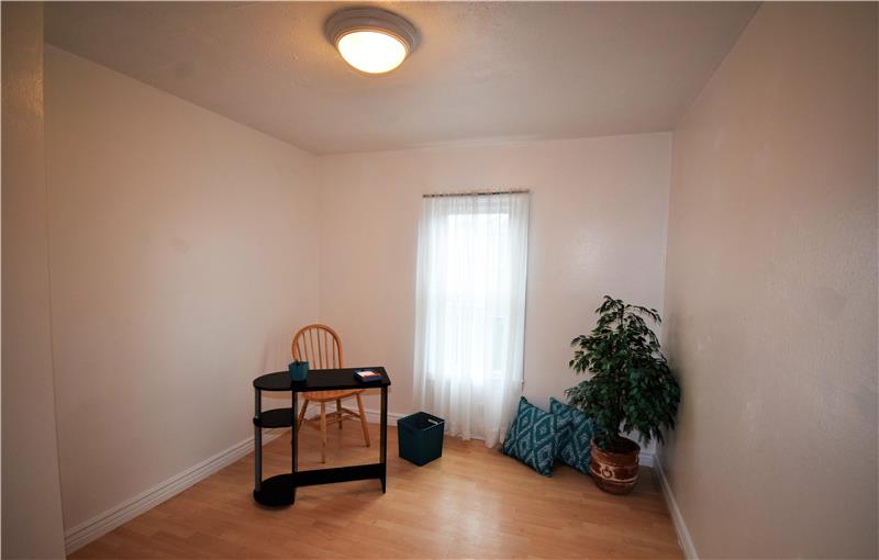 Your bonus room also has built-in cabinetry/closet space to the left of this photo