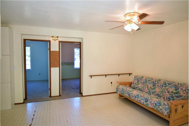 The door on the left is the 3rd bedroom, the door on the right is the bonus room.