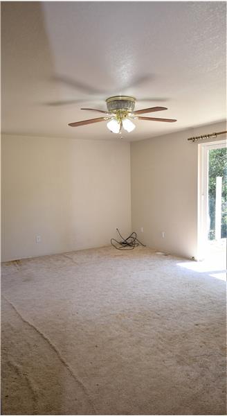 The master bedroom has a master bath, huge walk-in closet and a balcony.