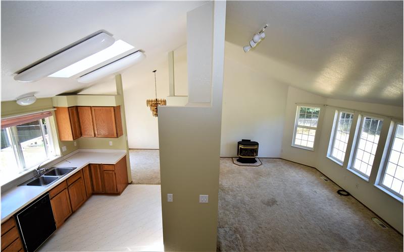 On the stairs overlooking the kitchen, living room and dining room.
