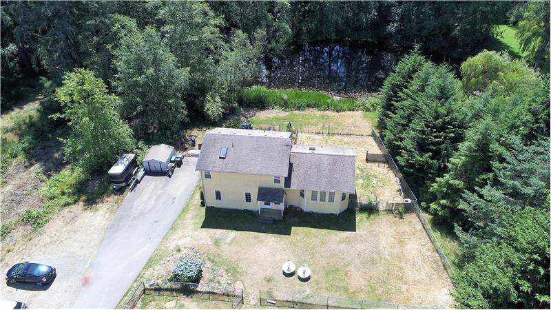 Another overhead view of the home and pond!