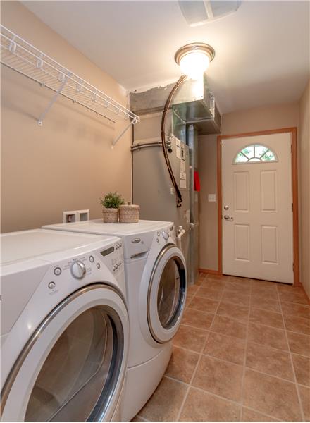 Utility/Mud room.  Heat pump provides year round comfort