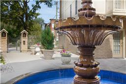 European style fountain in courtyard