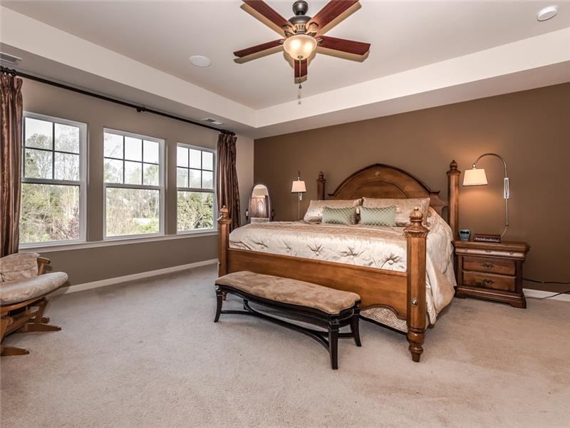 11312 Ardrey Crest Drive: Serene and spacious master suite with trey ceiling, en-suite bathroom, large walk-in closet.