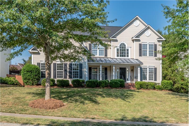 Great curb appeal to this turn-key Ballantyne home with side-load garage.