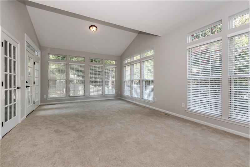 First floor bonus room with vaulted ceiling, brand new carpet, new blinds.
