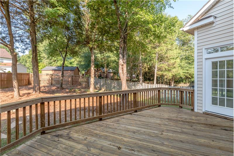 Large deck is a natural extension of home's living and entertaining areas.